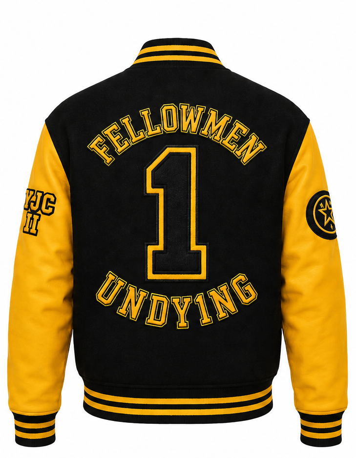 Back view of a varsity-style jacket with a black body and yellow sleeves, featuring the words 'FELLOWMEN UNDYING' and a large number 1 on the back, plus sleeve patches.