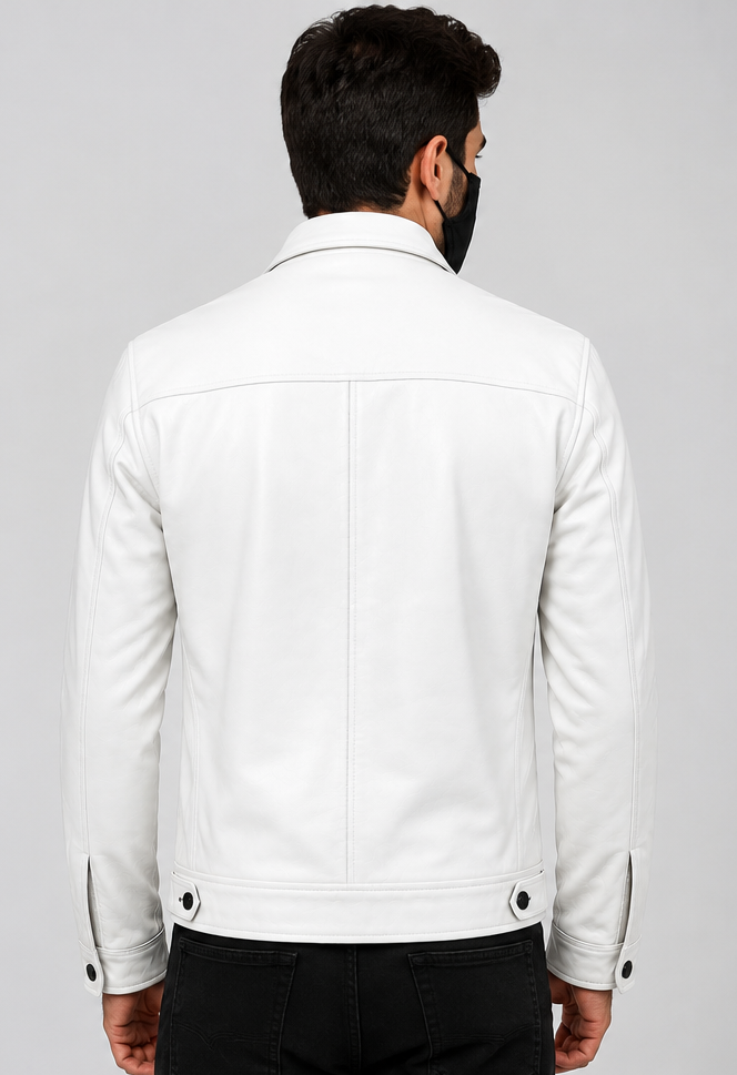 A man viewed from the back wearing a white leather jacket with black buttons and a black face mask, set against a plain light gray studio background.