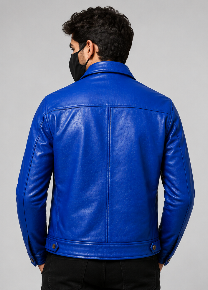 A man wearing a bright royal blue leather jacket, shown from the back against a neutral gray studio background.