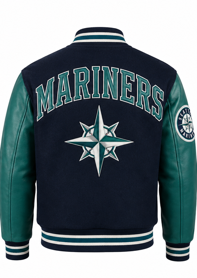 The back of a Seattle Mariners varsity jacket features a navy blue fleece body, teal faux leather sleeves, and 'MARINERS' text with the team's compass star logo.