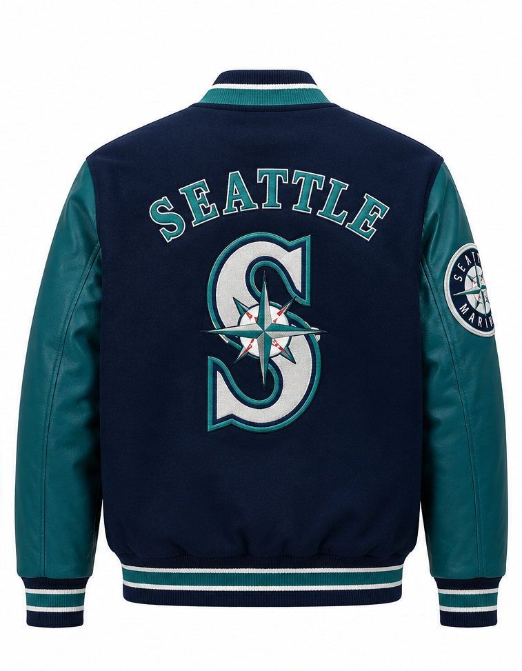 The back of a Seattle Mariners varsity jacket in navy and teal, featuring 'SEATTLE' and the team logo embroidered on the back, with a team patch on the sleeve.