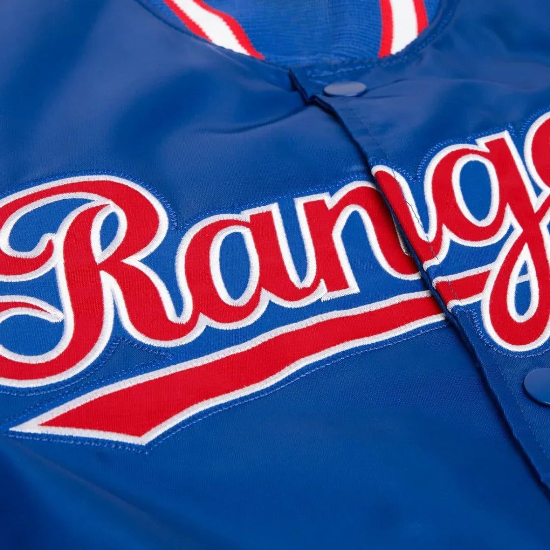 Close-up of a blue jacket with 'Rangers' text in red and white