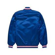 A royal blue satin bomber jacket shown from the back, featuring classic ribbed cuffs and hem with red and white stripes, set against a plain white background.