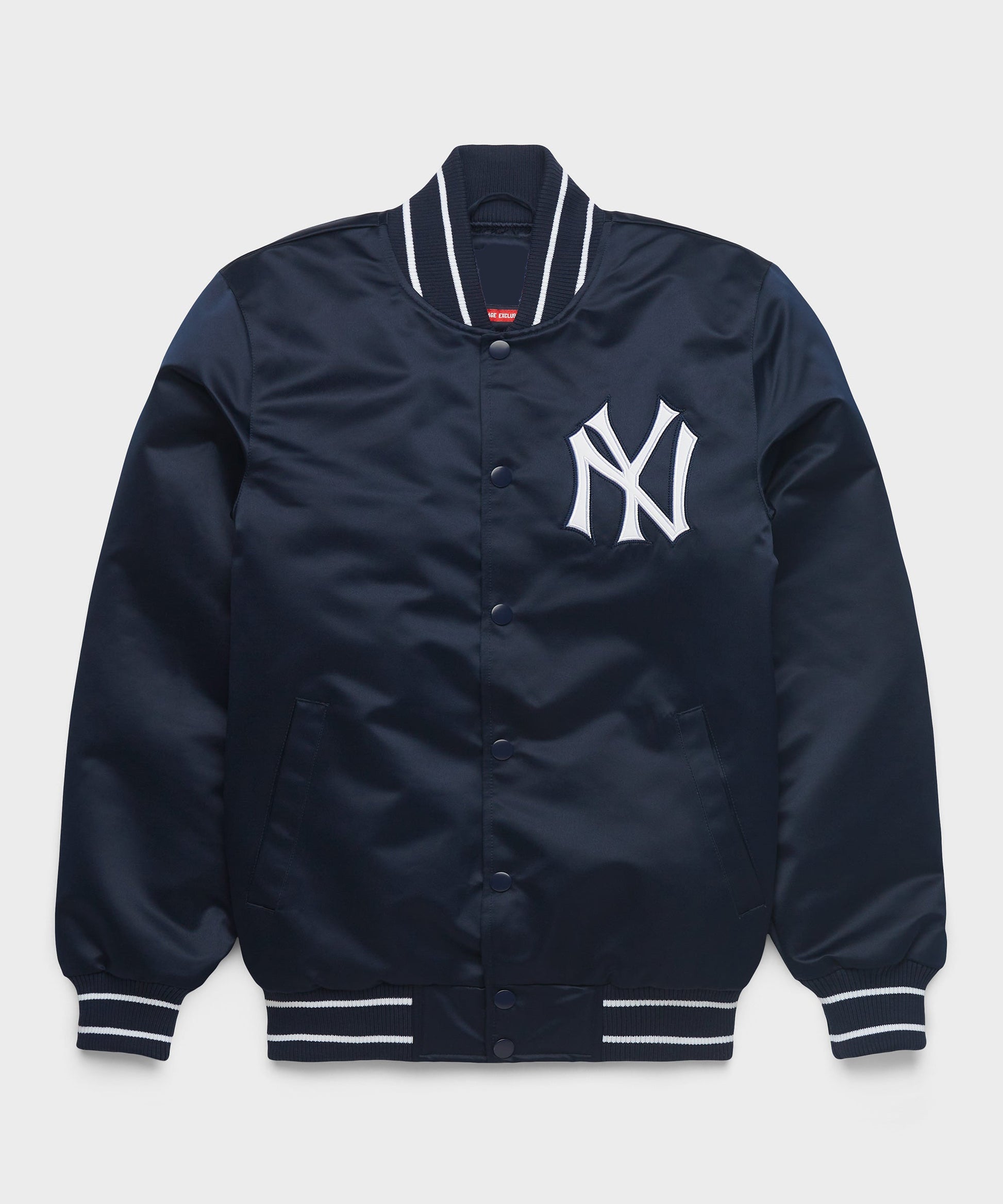 A navy blue satin varsity jacket featuring the white New York Yankees logo on the chest, with white and black striped ribbed collar, cuffs, and hem.