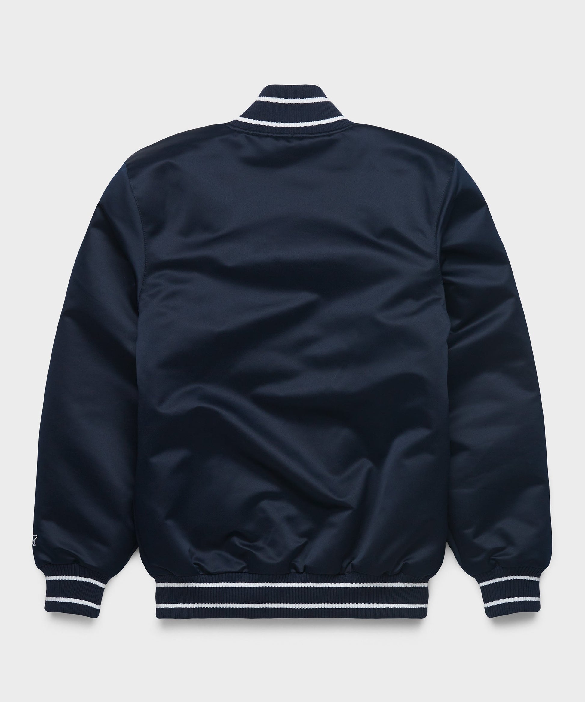 Navy blue jacket with white trim on a light gray background