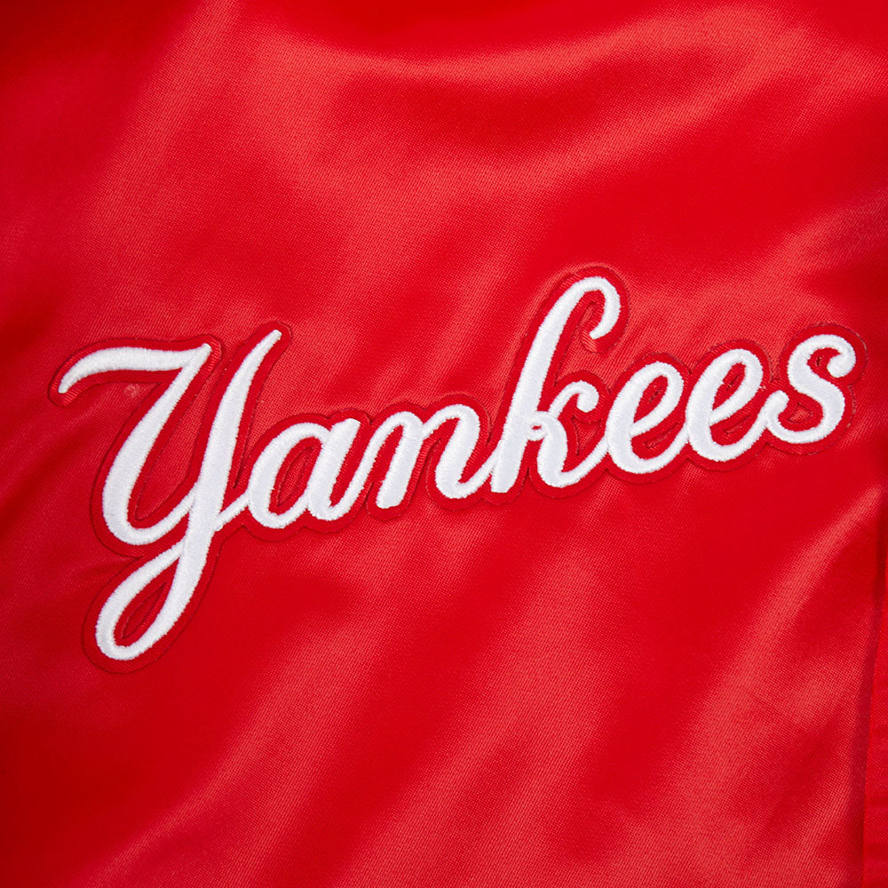 Red fabric with 'Yankees' embroidered in white