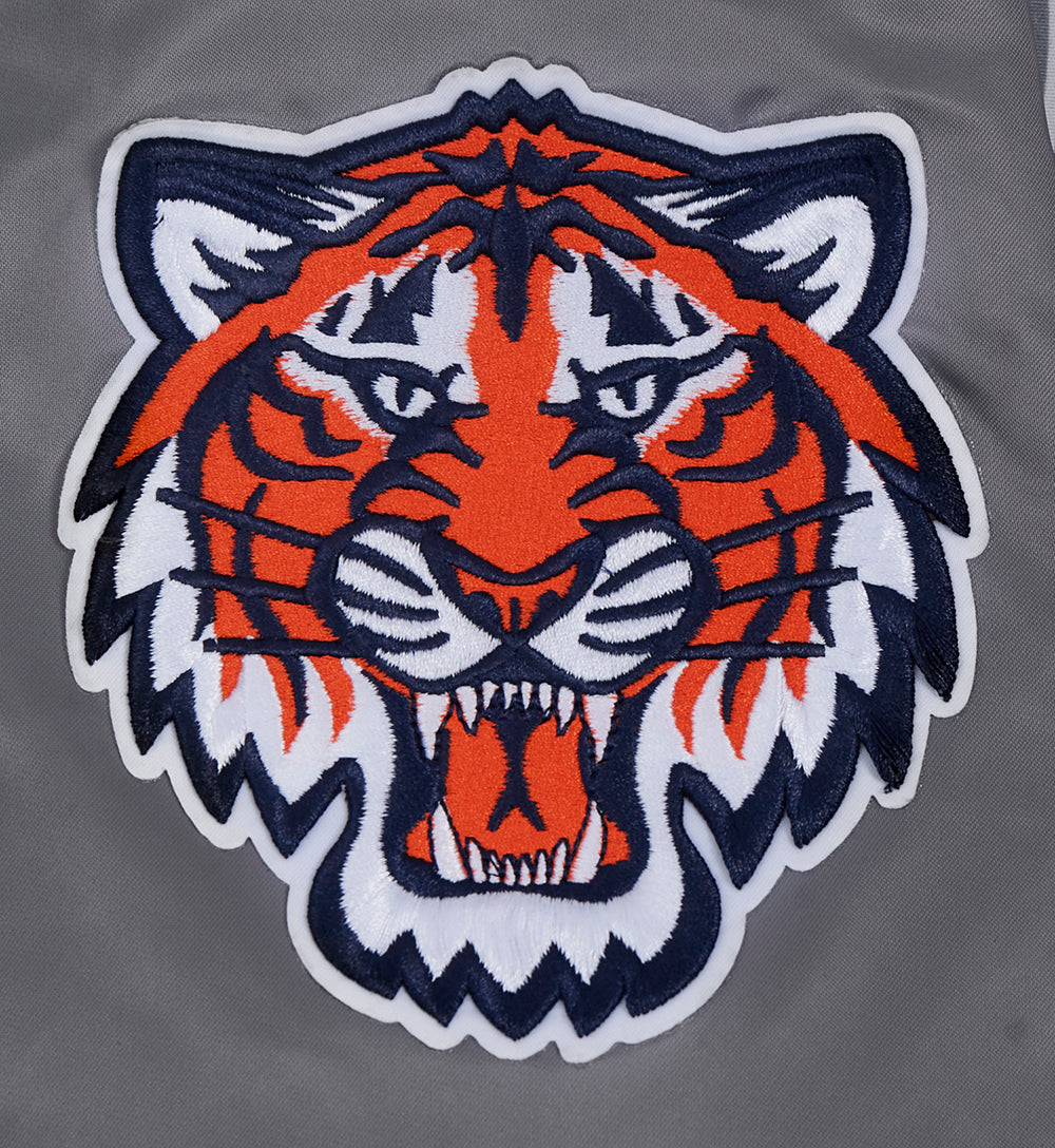 Embroidered tiger patch on a gray background