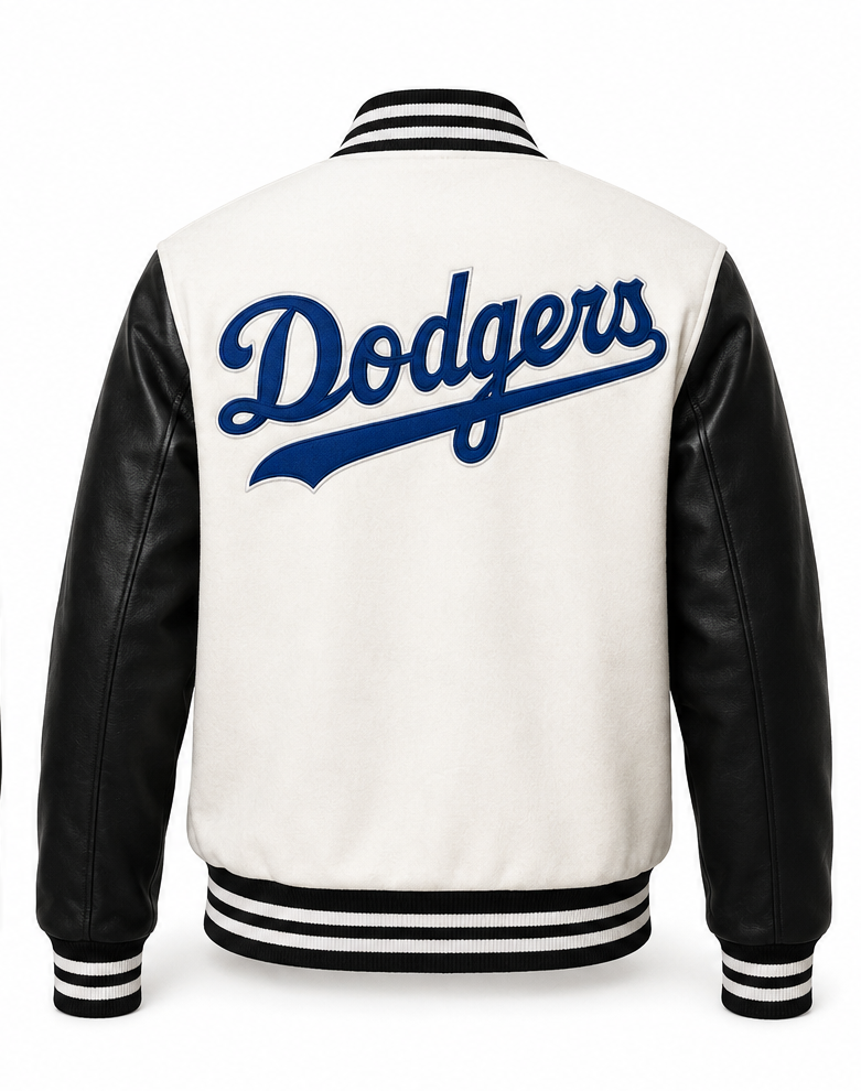 Back view of a varsity-style jacket with a white body, black leather-look sleeves, and black-and-white striped ribbing. The back is embroidered with 'Dodgers' in blue script across the center.
