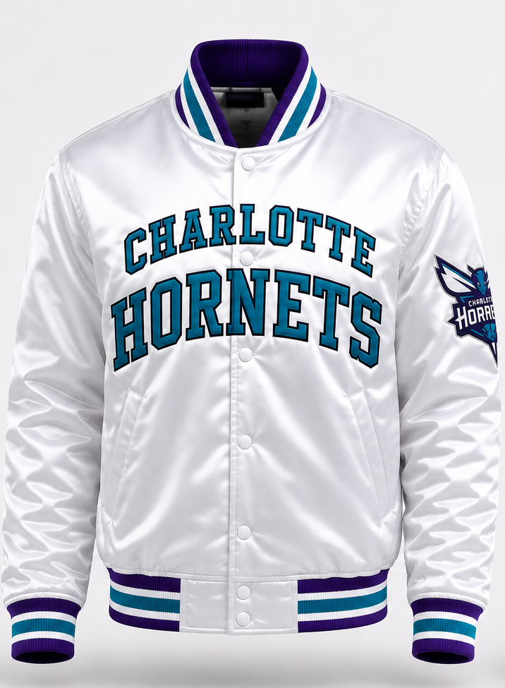 A white satin jacket featuring 'CHARLOTTE HORNETS' in teal and blue varsity lettering on the front, with a team logo patch on the right sleeve and striped ribbed collar, cuffs, and hem in purple, teal, and white.