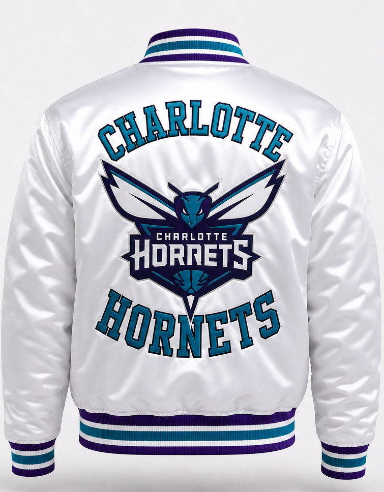 White satin varsity jacket shown from the back, featuring a large Charlotte Hornets logo and text in teal and purple, with striped ribbed collar, cuffs, and hem.