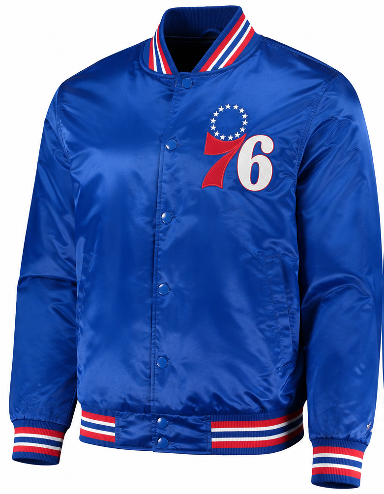 A royal blue satin varsity jacket with red and white striped ribbed collar, cuffs, and hem. The left chest features the Philadelphia 76ers logo with a white '76' and a circle of white stars on a red ribbon.