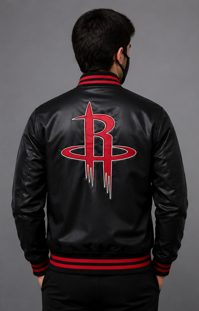 A man viewed from behind wearing a black leather jacket with red stripes on the collar, cuffs, and hem, featuring a large red Houston Rockets logo on the back.
