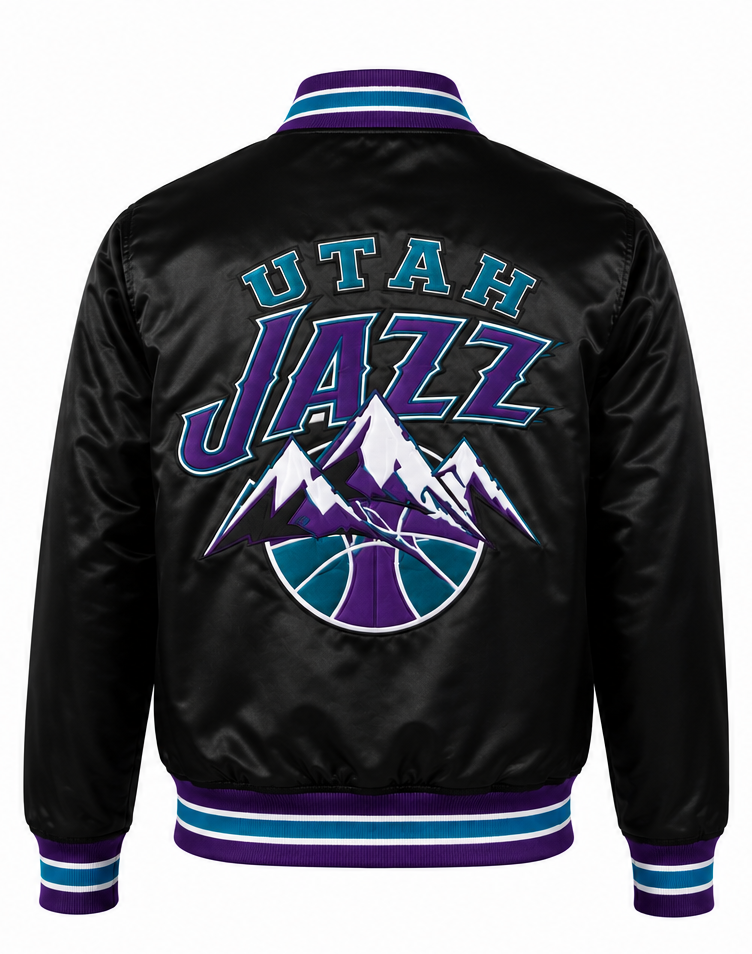 Black satin jacket with Utah Jazz logo on the back, featuring purple and teal lettering and mountain embroidery, with striped collar, cuffs, and hem.
