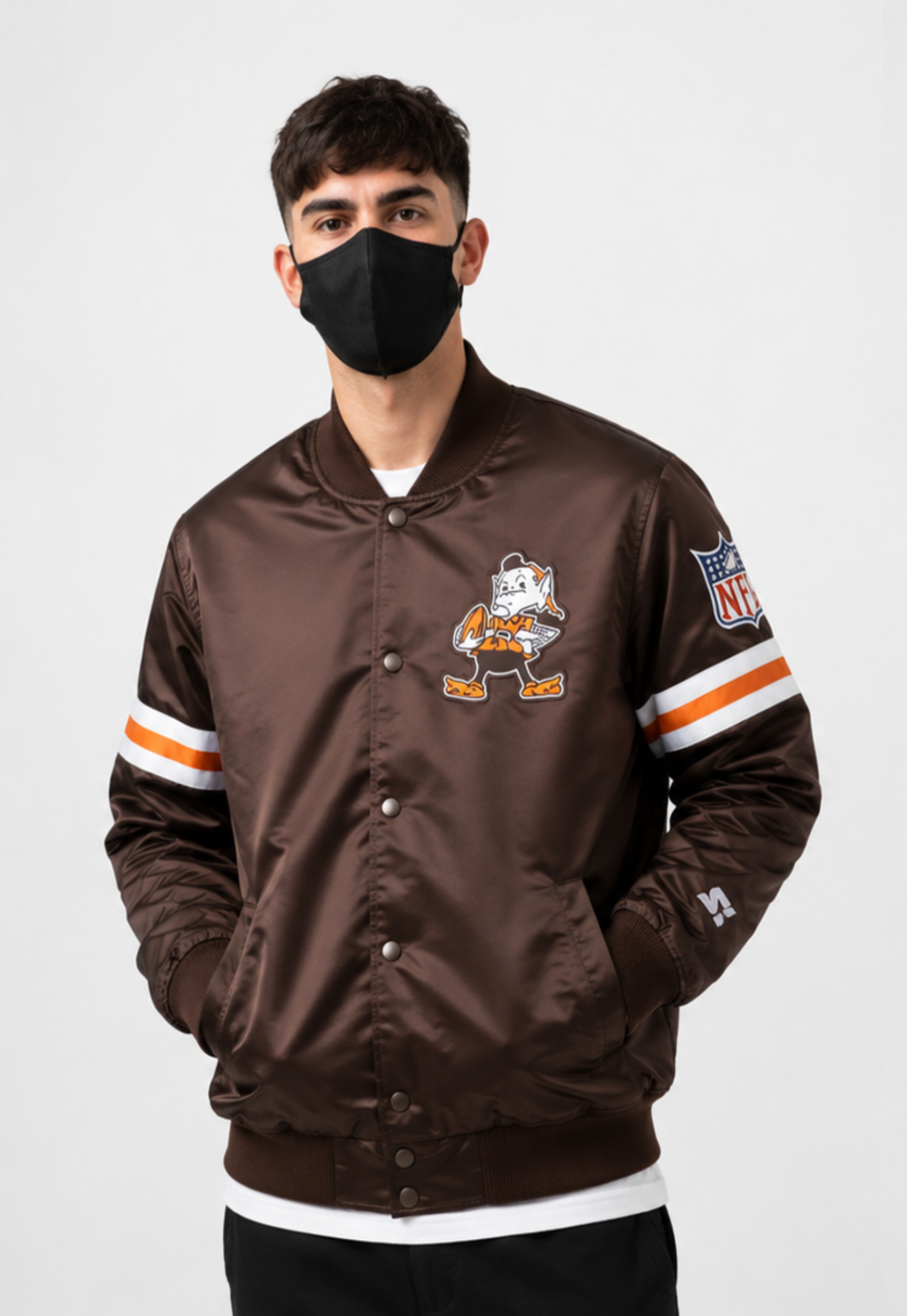 Person wearing a Cleveland Browns
brown jacket with a cartoon character design on a white background