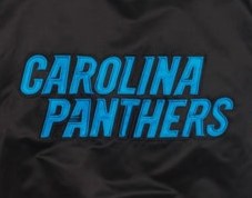 Black jacket with 'Carolina Panthers' text in blue on a textured background