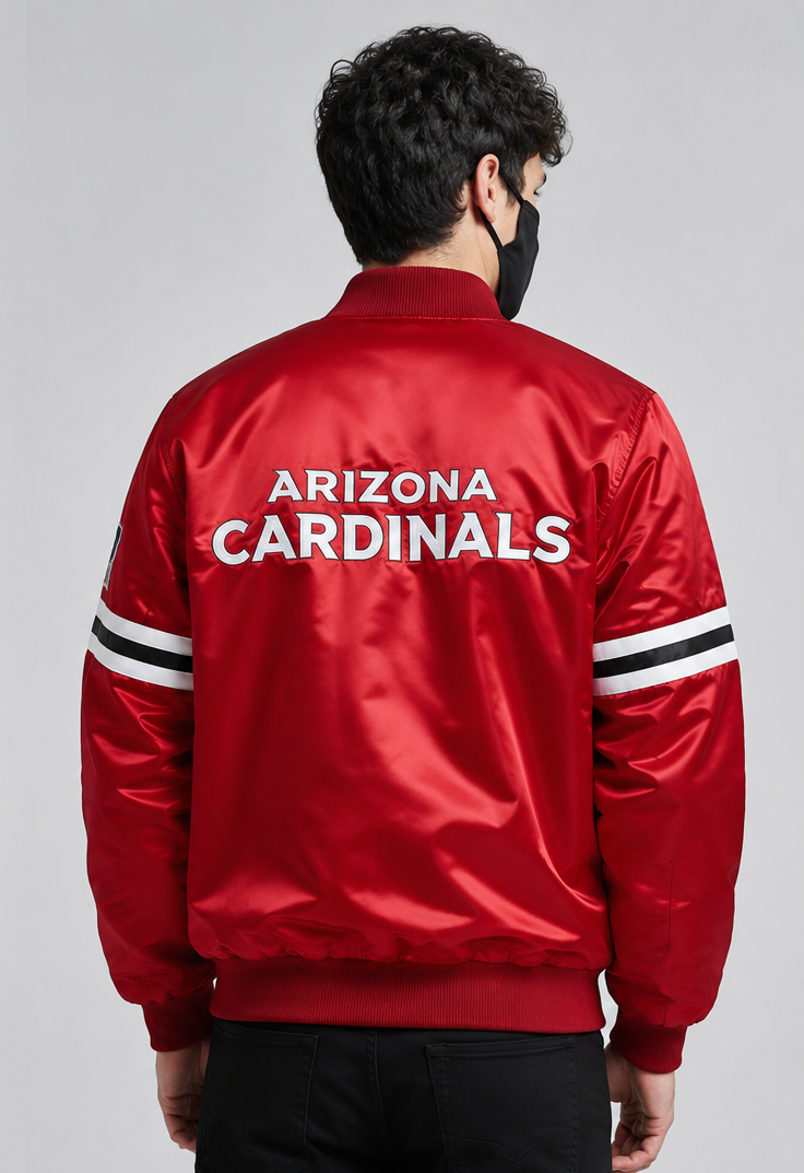 Person wearing a red 'Arizona Cardinals' jacket on a gray background