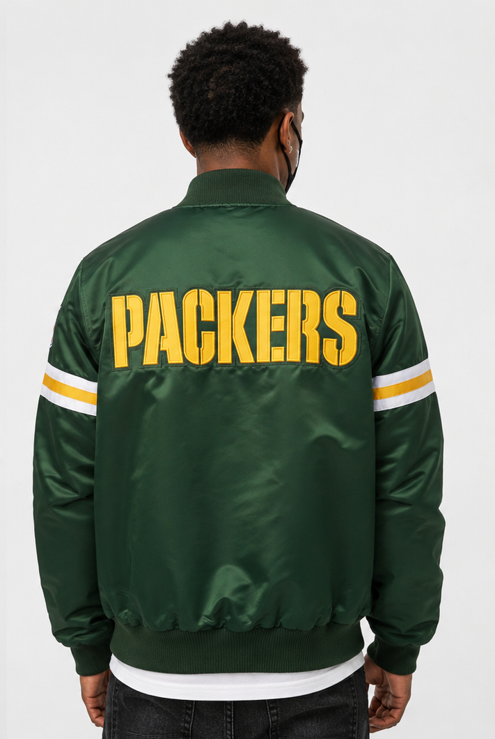 Green Bay Packers jacket with 'Packers' text on the back, worn by a person against a white background