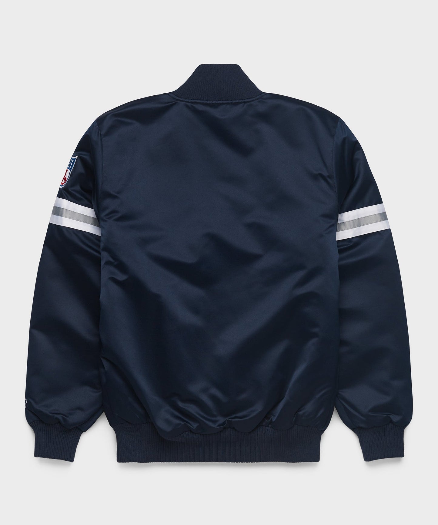 Dallas Cowboys Navy blue bomber jacket with white stripes on sleeves against a light gray background