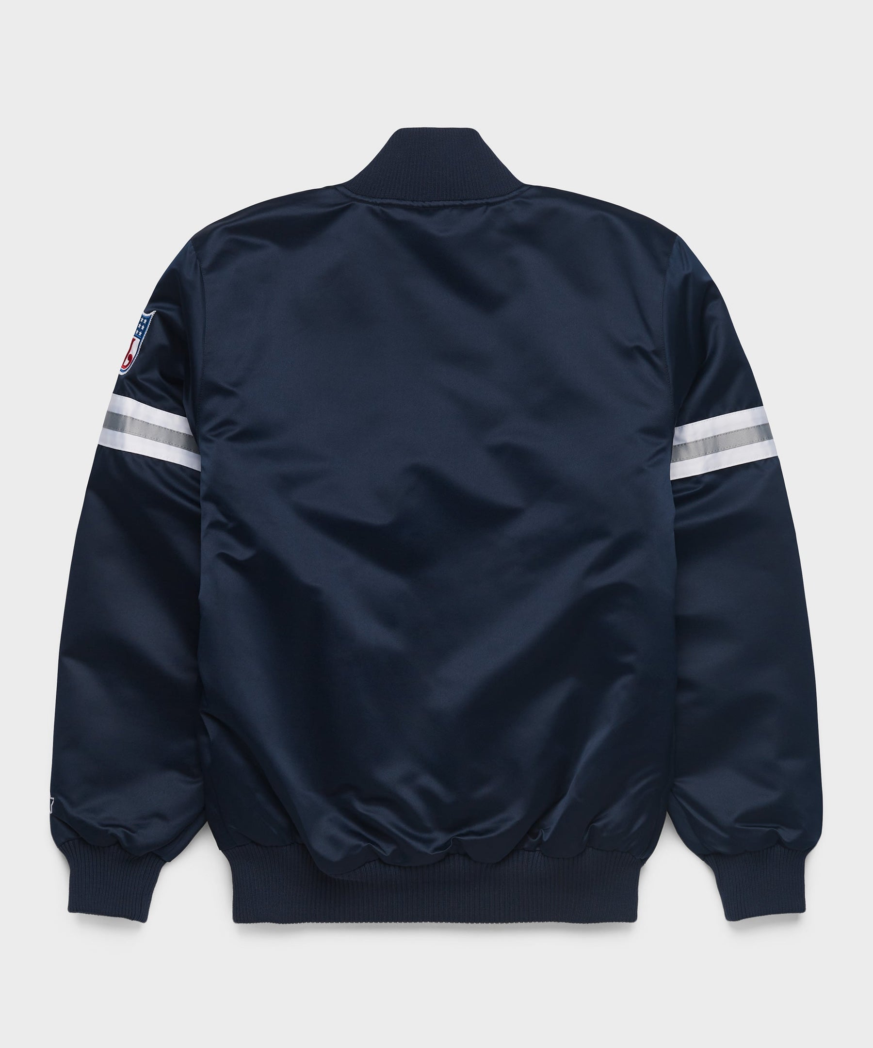 Dallas Cowboys Navy blue bomber jacket with white stripes on sleeves against a light gray background