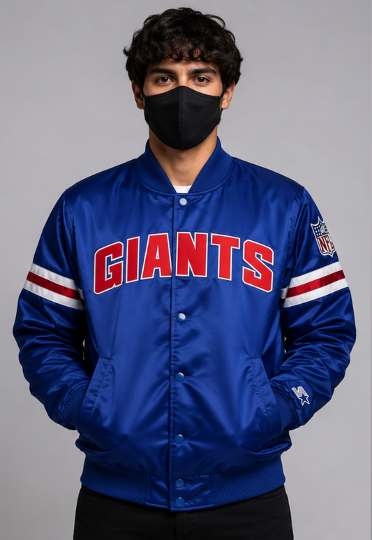 Person wearing a New York Giants blue 'Giants' jacket with a gray background