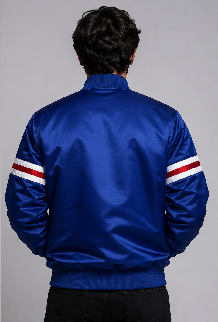 New York Giants Blue jacket with red and white stripes on the sleeves against a gray background