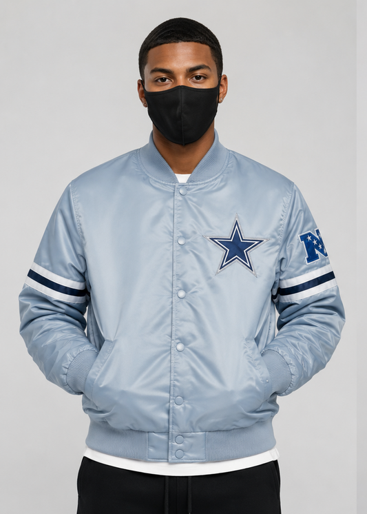 A Men wearing the Dallas Cowboys Light Blue Satin Bomber Jacket with a white background