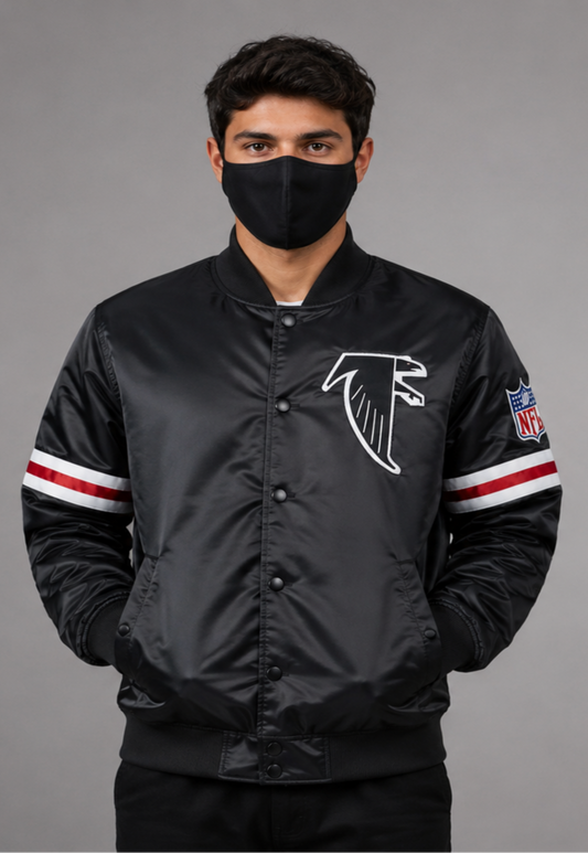 A man wearing the Atlanta Falcons black satin Jacket with the NFL official logo and a grey background