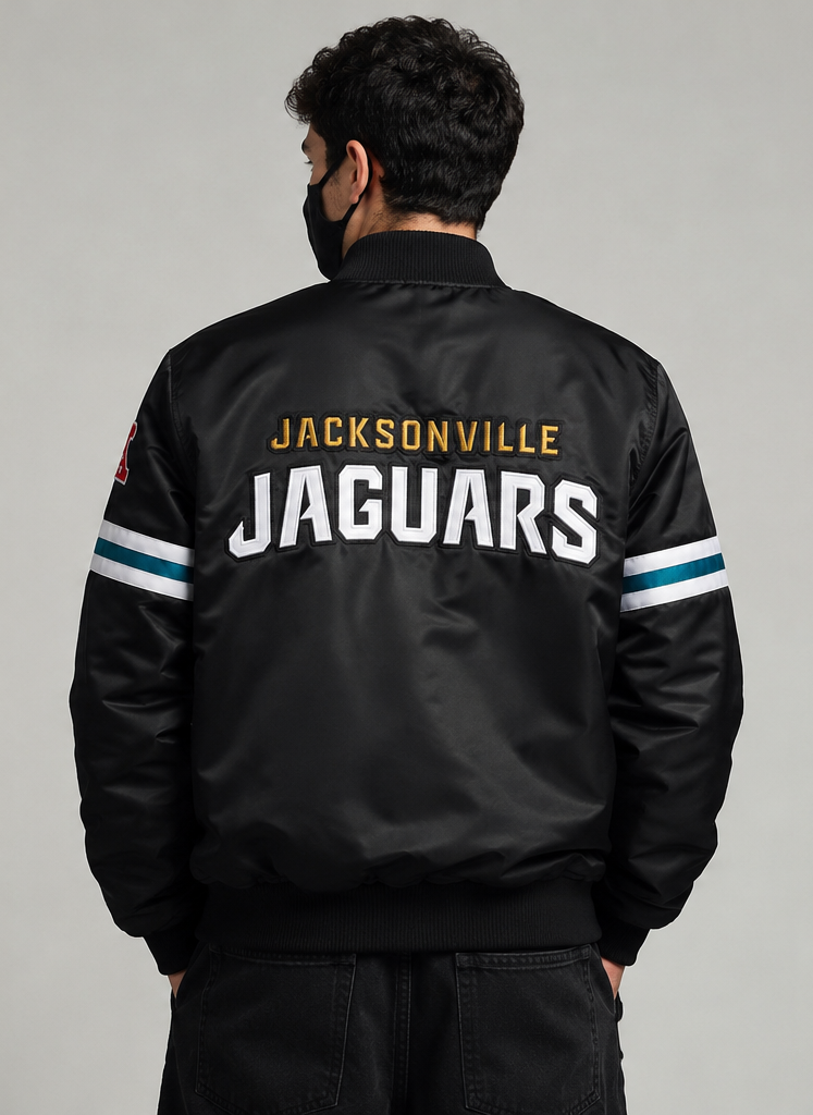 Men Wearing the Jacksonville Jaguars Black Satin Jacket with team logos with grey background