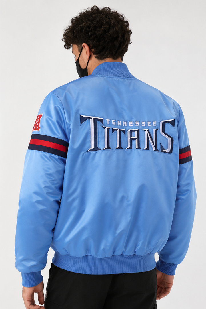 Men Wearing The Tennessee Titans Light Blue Satin Jacket with team logos with white background