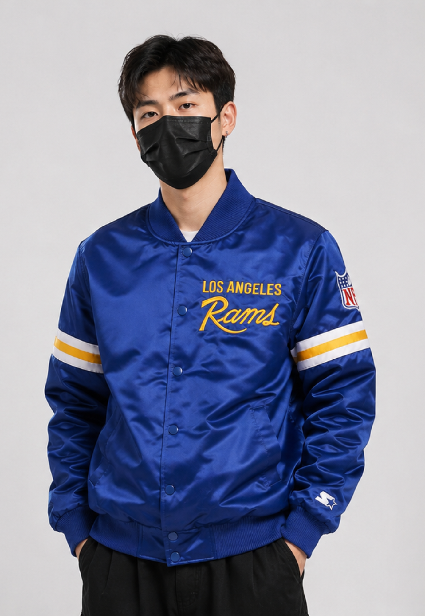 A Men Wearing The Los Angeles Rams Satin Jacket with team logos with White Background