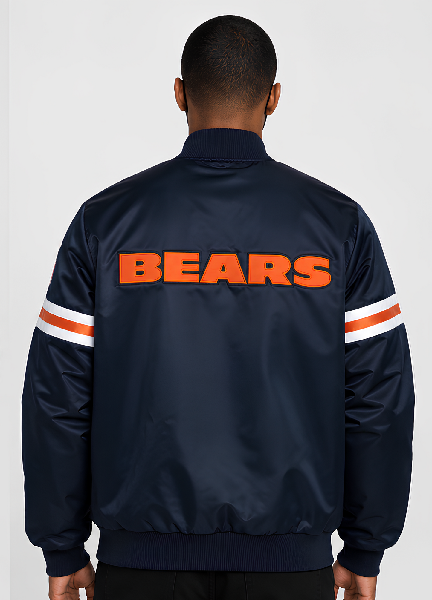 Navy jacket with 'BEARS' text on the back, worn by a person against a white background