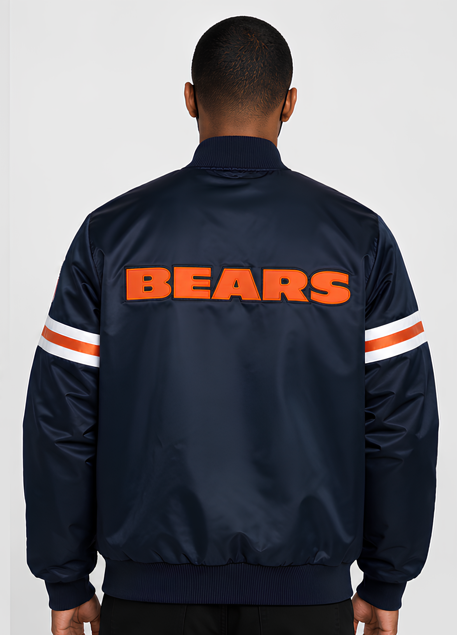 Navy jacket with 'BEARS' text on the back, worn by a person against a white background
