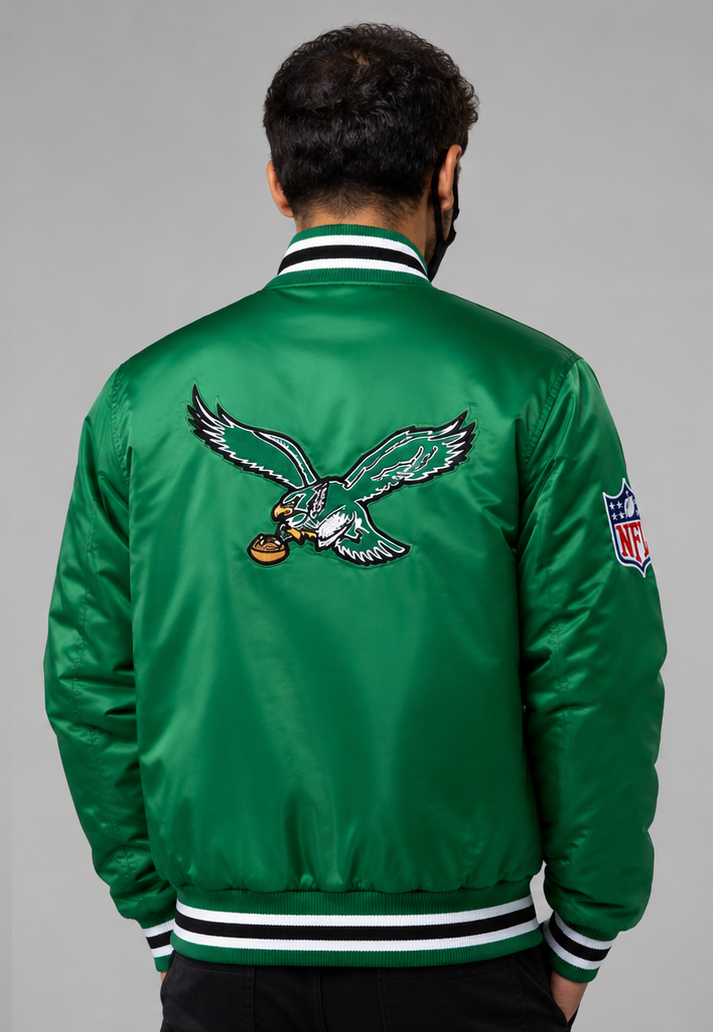 Philadelphia Eagles Green sports jacket with a logo on the back against a gray background