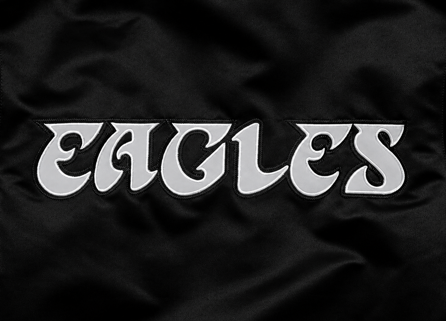 Philadelphia Eagles Black fabric with 'EAGLES' printed in white letters