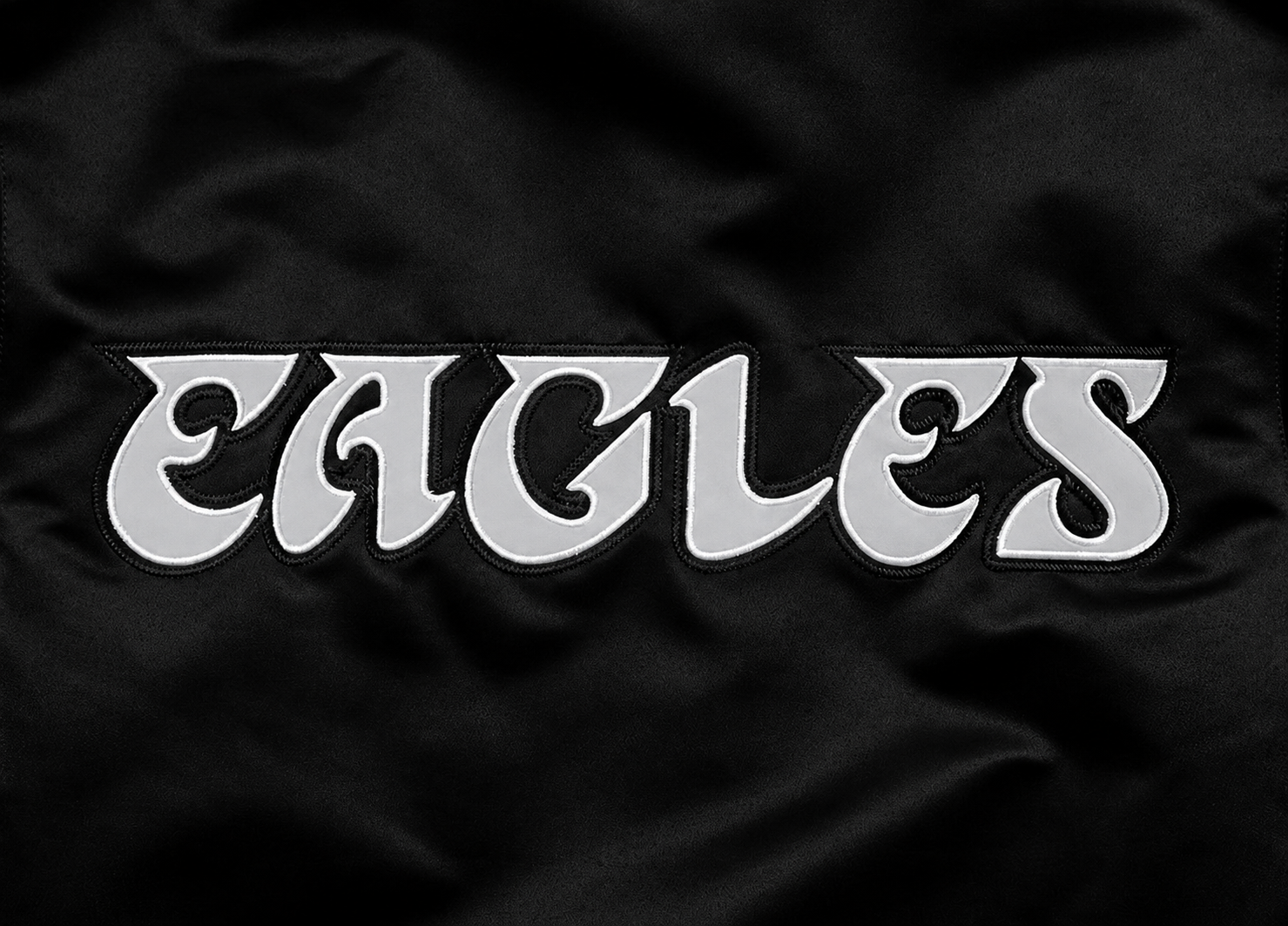 Philadelphia Eagles Black fabric with 'EAGLES' printed in white letters