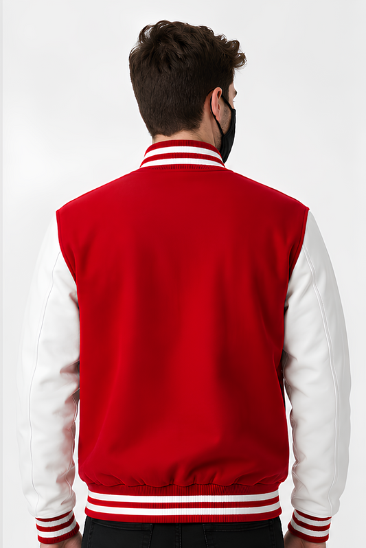 Person wearing a red and white varsity jacket on a white background