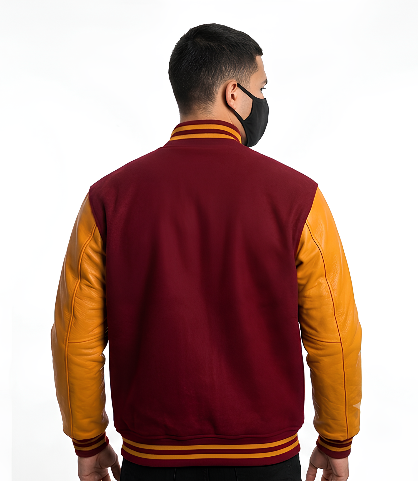 Man wearing a maroon and orange varsity jacket on a white background