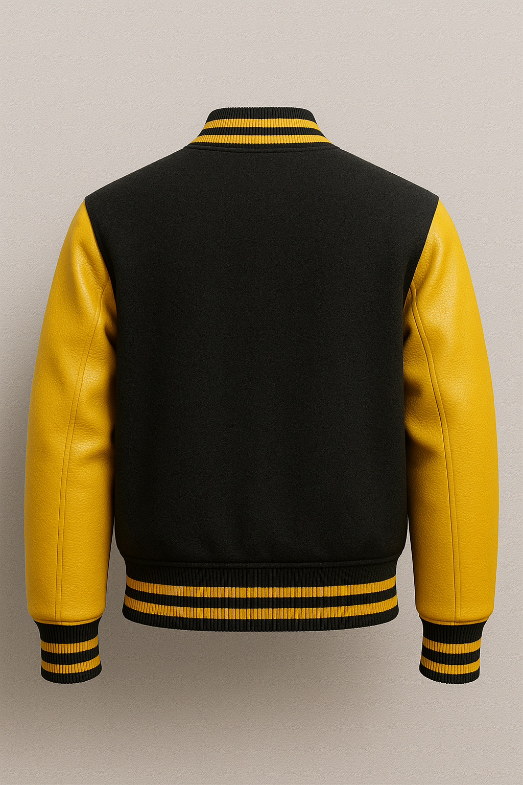 Black and yellow varsity jacket on a light gray background